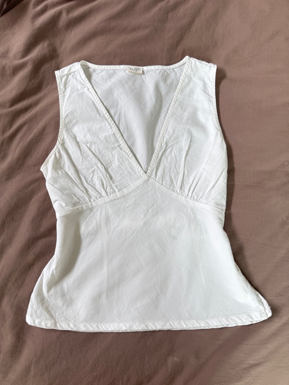 John Galt white top